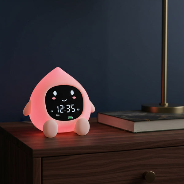Réveil enfant jour et nuit pêche, posé sur une table de nuit
