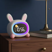 Réveil enfant jour et nuit lapin, posé sur une table de nuit